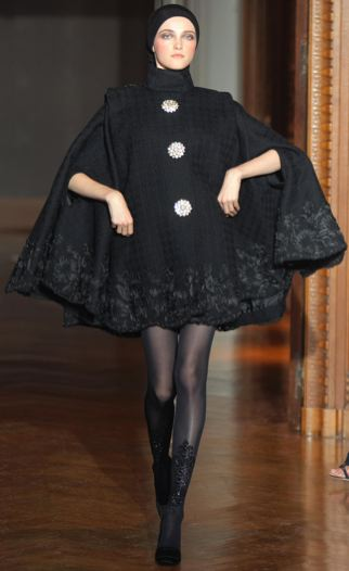 Illustration for article titled Christian Lacroix Couture Show A Blitz Of Somber Creativity For Dark Times